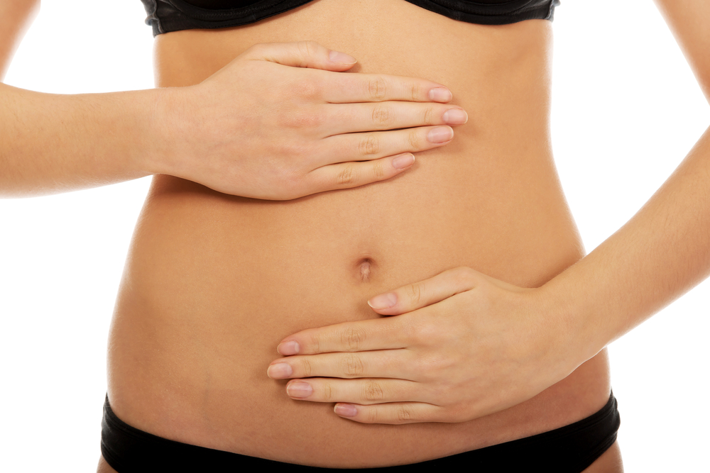Close up of a woman's stomach to represent gut health