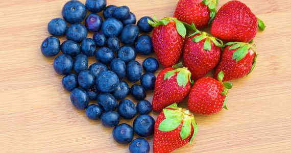 Blueberries and strawberries in a heart shape