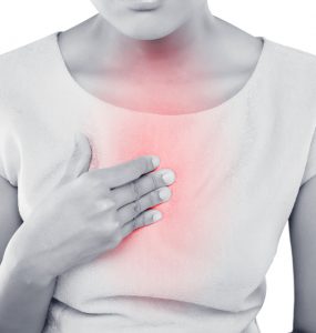 Woman with heartburn