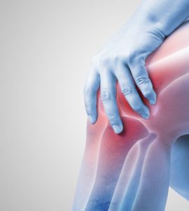 Close up of knee with glowing red showing joint pain