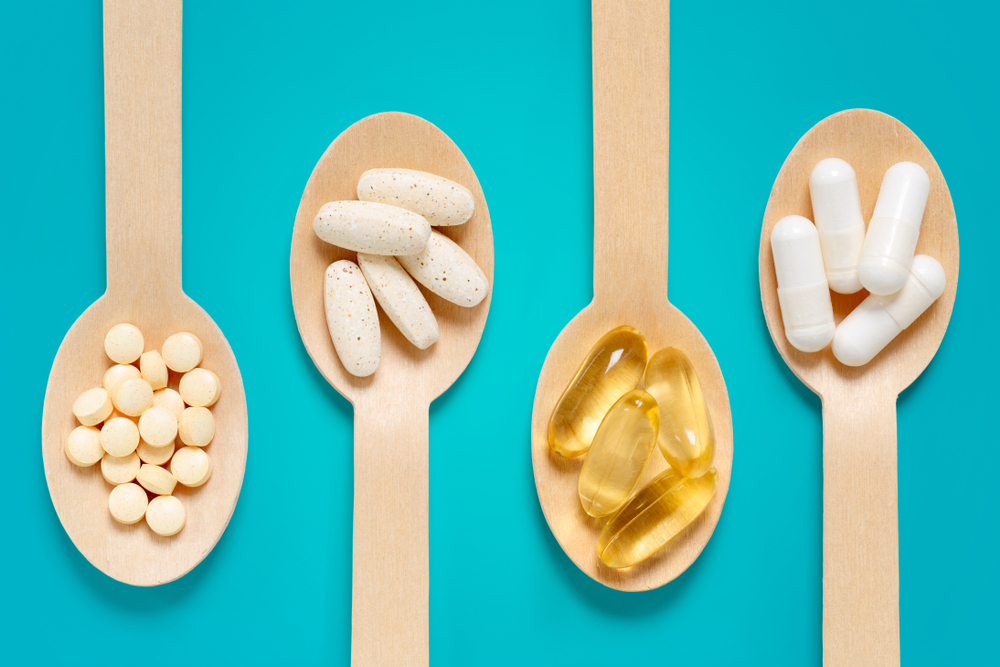 Spoons containing different types of food supplements
