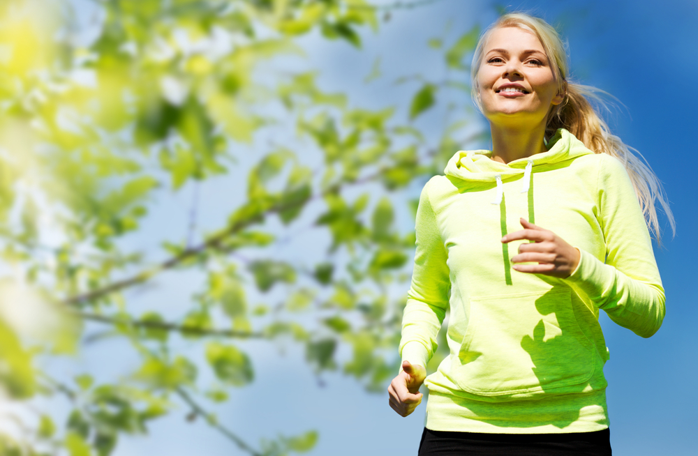Close up of woman enjoying a spring run outdoors