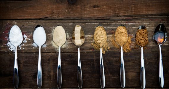 Different sugar sources on spoons