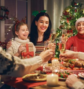 Christmas family scene eating Christmas dinner