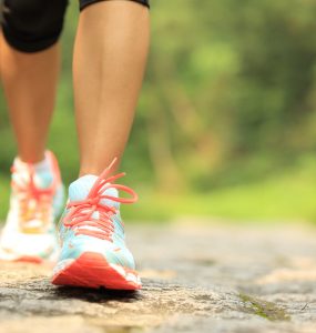 Close up of woman's trainers while out walking