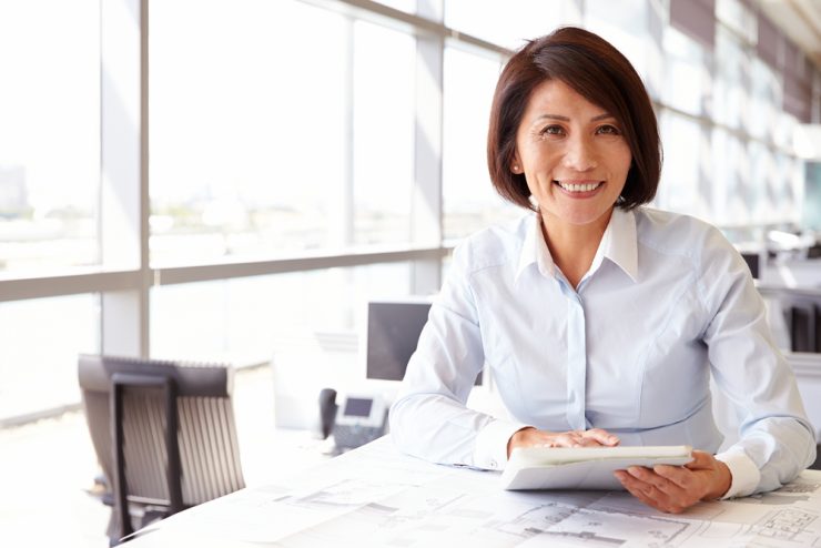 MIddle aged woman at work in office