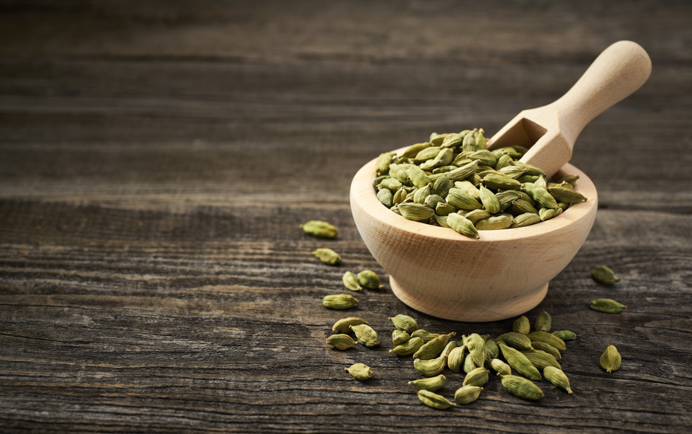 A bowl of cardamom pods