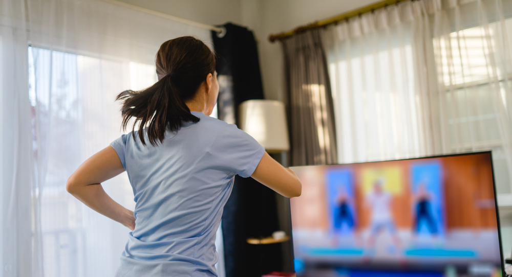 Woman doing an aerobic exercise indoors