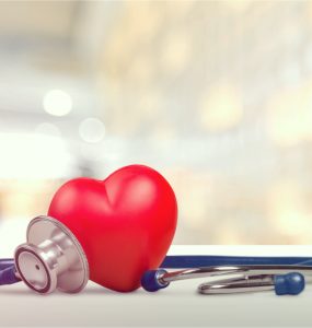 A red heart and stethoscope to represent heart health