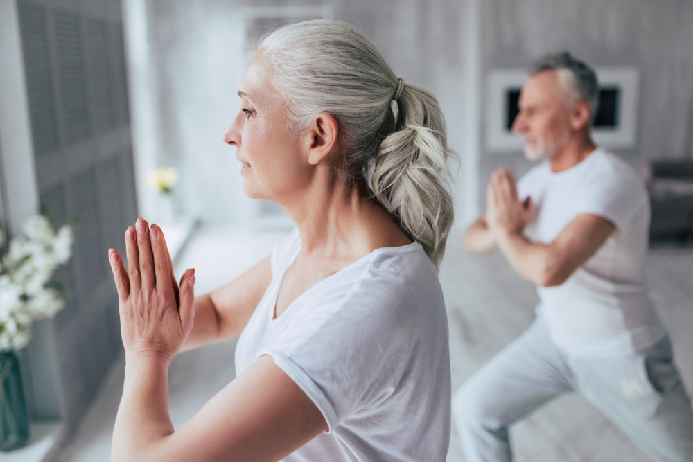 Older woman practising yoga