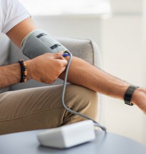 Close up of man taking blood pressure reading