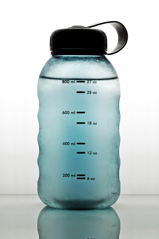 A water bottle with measures on