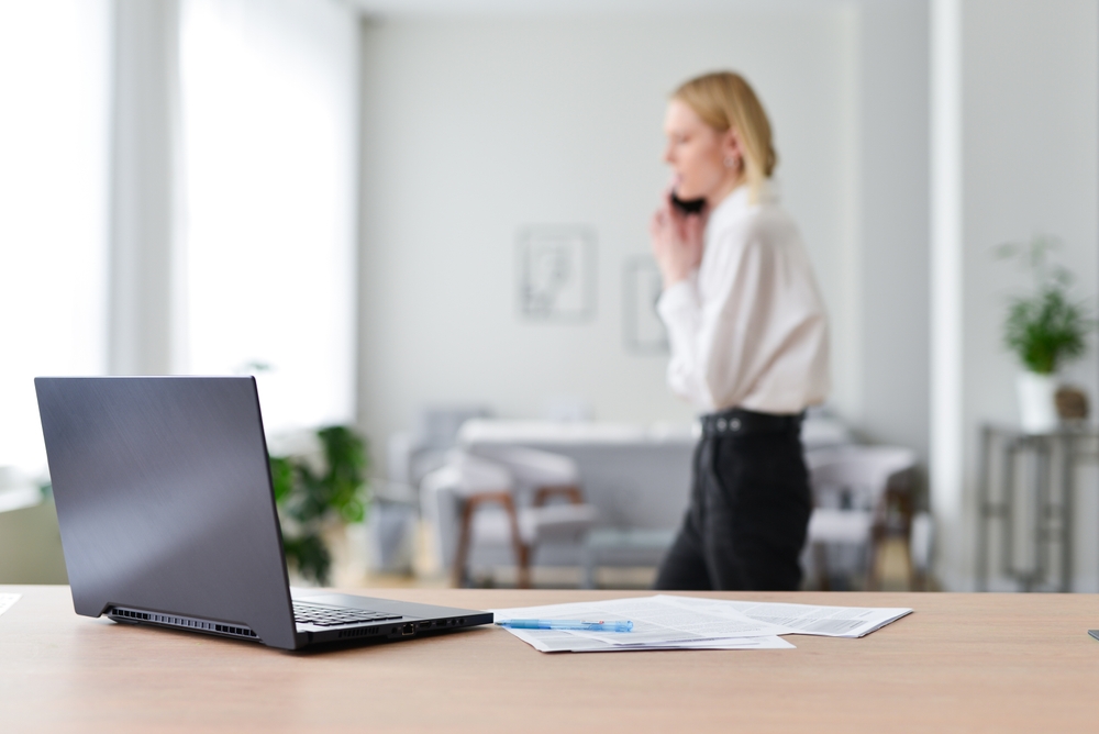 Woman taking time away from desk to move around and walk